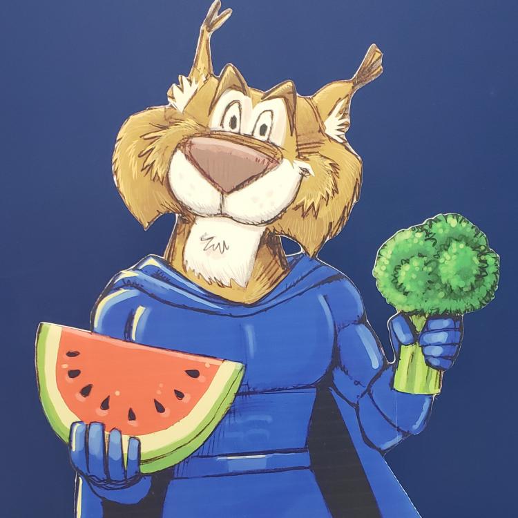  wildcat holding fruit and vegetable